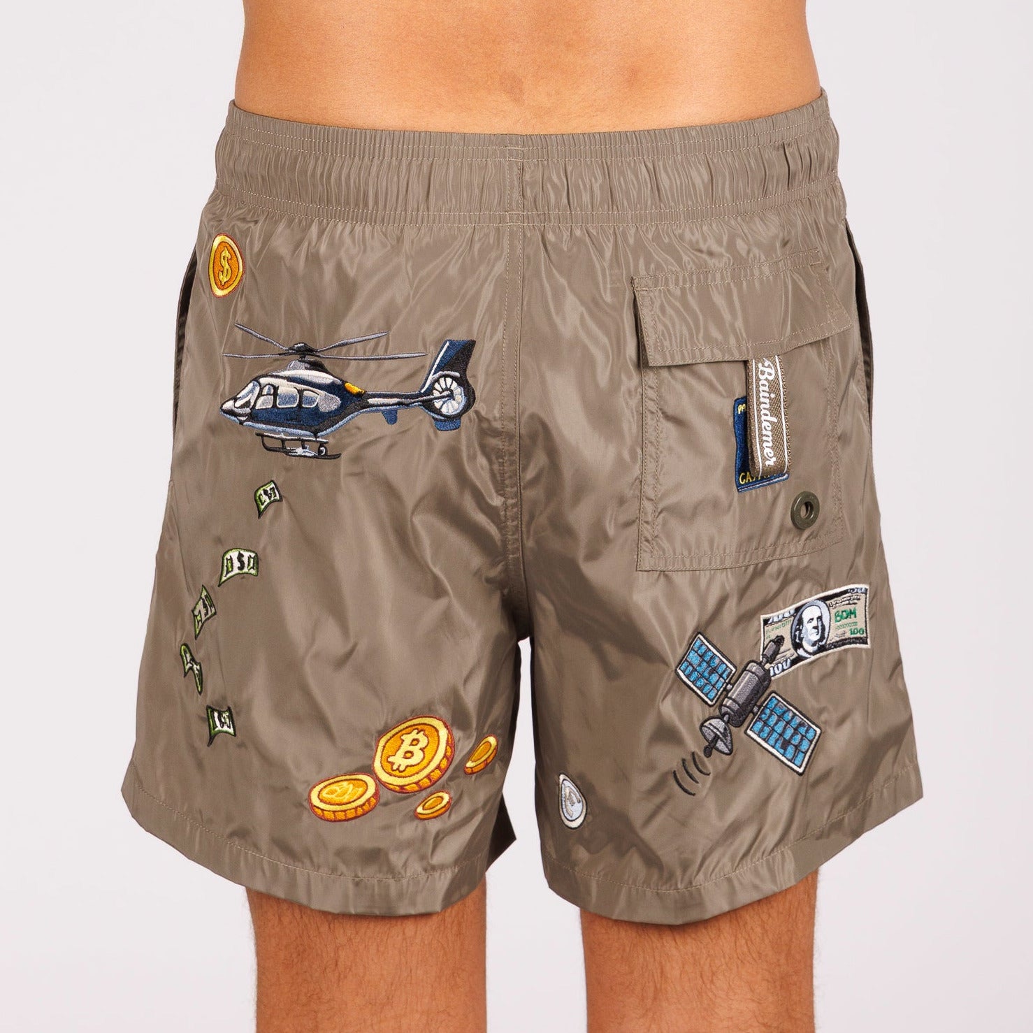 Khaki swim shorts back view with illustrated graphic