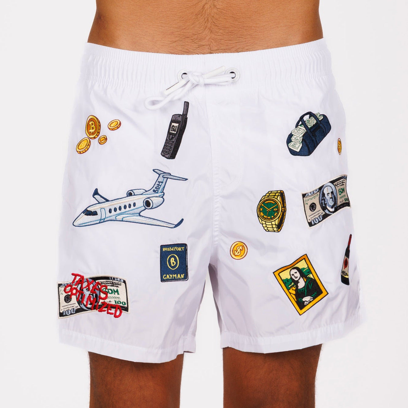 White swim shorts front view with illustrated graphic and “Taxes optimized” text
