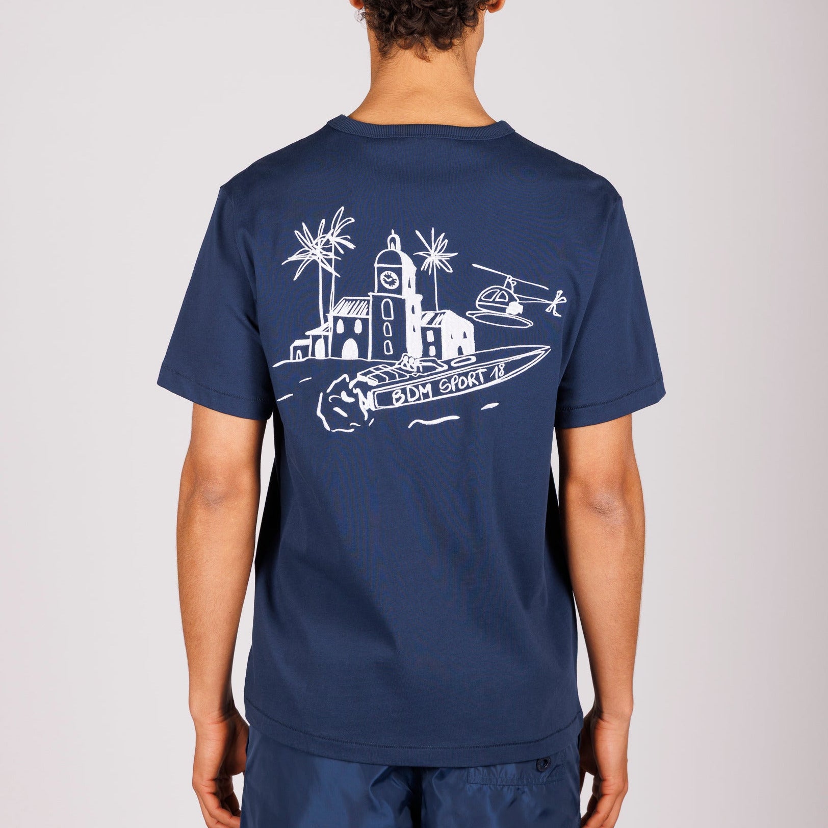 Navy blue T-shirt back view with illustrated graphic and “BDM sport 18” text