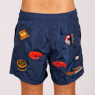 Navy blue swim shorts back view with illustrated graphic